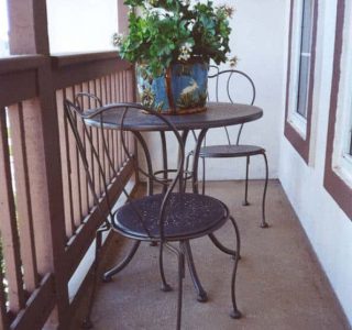 Small Balcony with table and two chairs