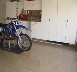 Epoxy Flooring in family garage with a motorcycle